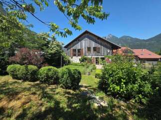 Nestled amidst lush greenery and rolling hills, this charming property offers a serene escape.