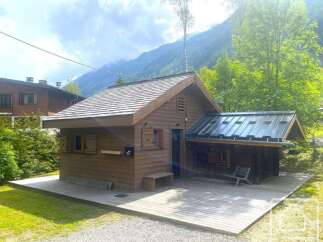 Experience rustic charm in this wooden cabin, perfect for a serene getaway.