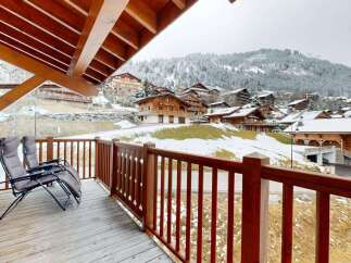 Experience breathtaking mountain views from this charming balcony, perfect for enjoying your morning coffee or evening relaxation.