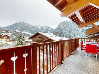 Experience breathtaking mountain views from this charming balcony, perfect for enjoying your morning coffee or evening wine.