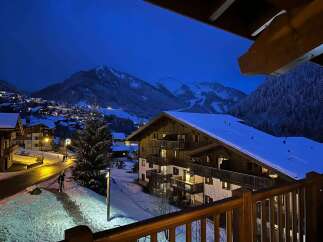 Experience the magic of a winter wonderland from this charming alpine property.