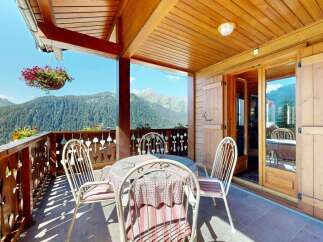 Enjoy breathtaking mountain views from this charming balcony, perfect for your morning coffee or evening relaxation.