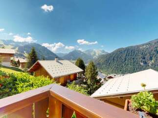 Experience breathtaking mountain views from this charming chalet, perfect for a serene getaway.