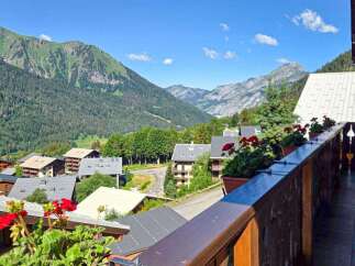 Experience breathtaking mountain views from this charming property, nestled in a picturesque alpine village.