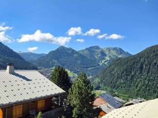 Experience breathtaking mountain views from this stunning property, nestled amidst the serene alpine landscape.