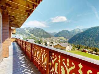 Experience breathtaking mountain views from this stunning balcony, perfect for enjoying your morning coffee or evening relaxation.