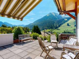 Enjoy breathtaking mountain views from this stunning patio, perfect for outdoor relaxation and entertaining.
