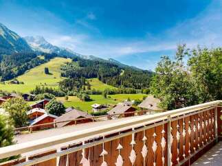 Enjoy breathtaking mountain views from this charming property's balcony, perfect for morning coffee or evening relaxation.