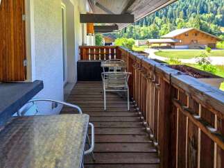 Enjoy breathtaking mountain views from this charming balcony, perfect for your morning coffee or evening relaxation.