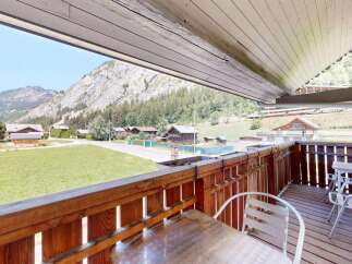 Enjoy breathtaking mountain views from this charming balcony, perfect for your morning coffee or evening relaxation.