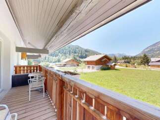 Enjoy breathtaking mountain views from this charming balcony, perfect for your morning coffee or evening relaxation.