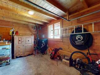 Discover this charming wooden cabin, perfect for outdoor enthusiasts.