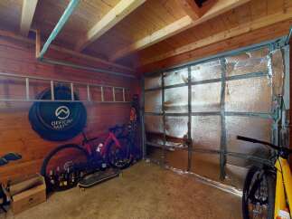 Discover this versatile garage space, perfect for storing vehicles and recreational equipment.
