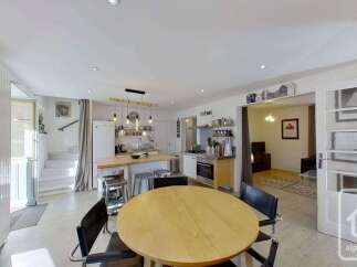 Discover this charming open-plan living space, perfect for modern living.