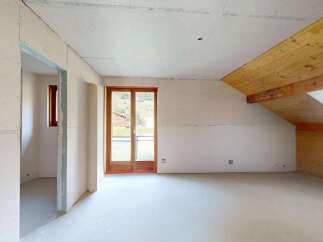 Discover this unfinished interior space, perfect for customization.