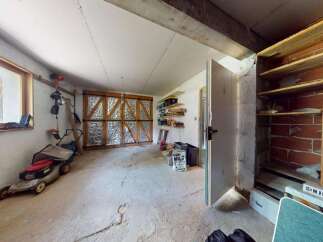 Discover this versatile garage space, perfect for storage or a workshop.