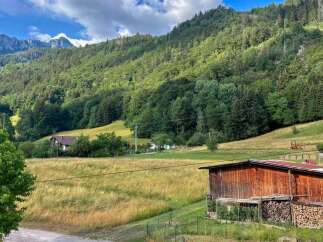 Nestled in a picturesque mountain valley, this property offers a serene escape with stunning natural beauty.