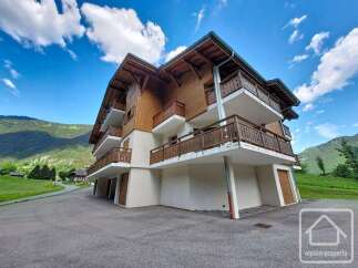 Discover this charming multi-story property nestled in a picturesque mountain setting.