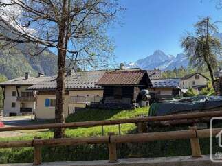 Nestled in a picturesque mountain village, this property offers stunning views of snow-capped peaks.