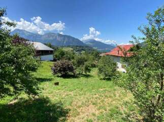 Nestled amidst rolling green hills and majestic mountains, this property offers a serene escape.