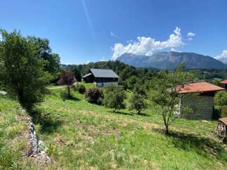 Nestled amidst lush greenery and rolling hills, this property offers a serene escape with breathtaking mountain views.