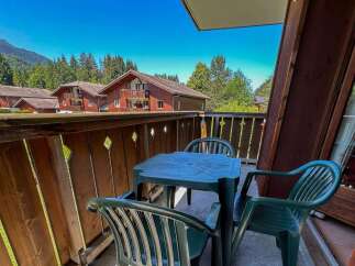 Enjoy breathtaking mountain views from this charming balcony, perfect for morning coffee or evening relaxation.