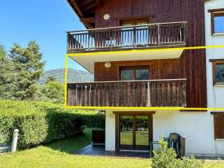 Experience mountain living with this charming property featuring multiple balconies offering stunning views of the surrounding landscape.