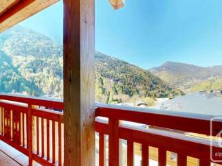 Enjoy breathtaking mountain views from this charming balcony, perfect for savoring your morning coffee or evening wine.