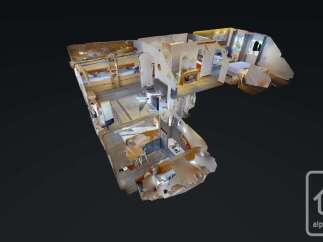 Explore this charming 3D model of a multi-level property, showcasing a cozy living space with bunk beds and a well-equipped kitchen.
