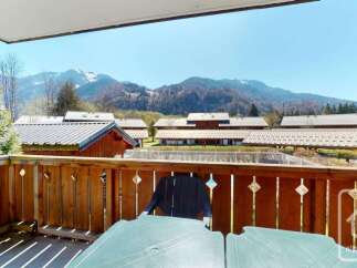 Enjoy breathtaking mountain views from this charming balcony, perfect for outdoor dining or relaxation.