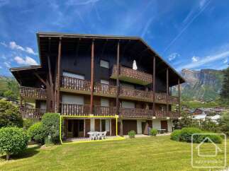This charming property features a spacious ground-floor apartment with direct access to a private garden area, perfect for outdoor entertaining.