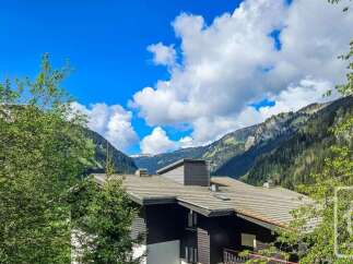 Nestled amidst breathtaking mountain scenery, this property offers a serene escape with stunning natural vistas.