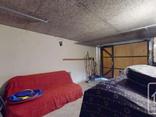 This versatile space offers ample storage solutions, perfect for a garage or workshop.