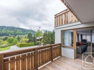 Enjoy breathtaking mountain views from this charming balcony, perfect for your morning coffee or evening relaxation.