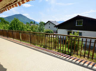 Enjoy breathtaking mountain views from this charming balcony, perfect for morning coffee or evening relaxation.