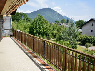 Enjoy breathtaking mountain views from this spacious balcony, perfect for outdoor relaxation and entertaining.