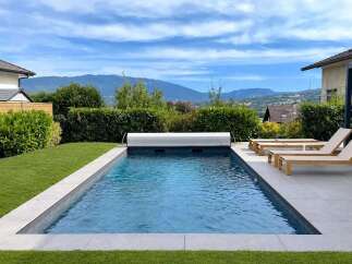 Experience luxury living with this stunning property featuring a pristine swimming pool and breathtaking mountain views.