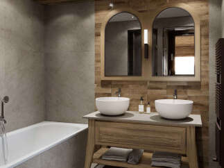 Experience rustic elegance in this luxurious bathroom featuring a freestanding bathtub and a double vanity with vessel sinks.