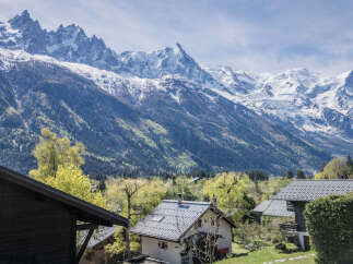 Experience breathtaking mountain views from this charming property nestled in a serene alpine setting.
