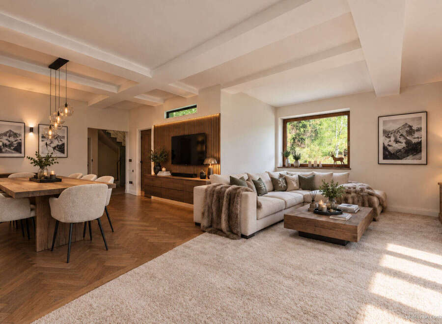 Experience modern mountain living in this stunning open-concept living and dining area.