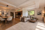 Experience modern mountain living in this stunning open-concept living and dining area.