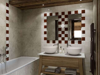 Experience rustic charm in this mountain-inspired bathroom, featuring a deep soaking tub and a dual-sink vanity with a warm wood finish.
