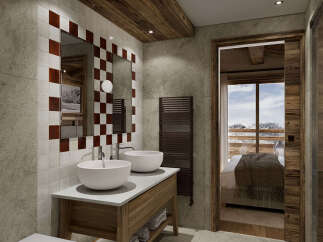Experience luxury mountain living in this stunning bathroom featuring a rustic wooden vanity with dual vessel sinks and a checkered tile accent wall.