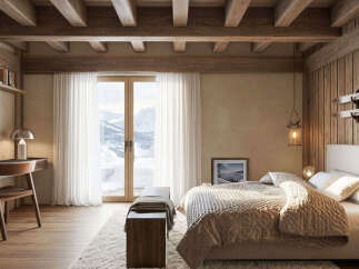 Experience rustic luxury in this charming mountain retreat bedroom, featuring exposed wooden beams and a cozy, inviting atmosphere.