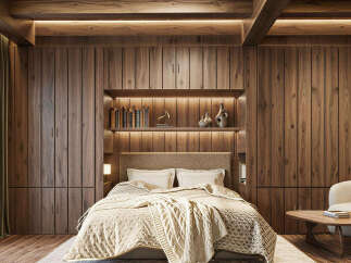 Experience rustic luxury in this stunning bedroom featuring warm wood paneling and a cozy, inviting atmosphere.