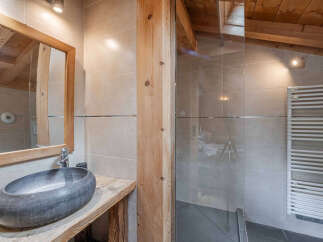 Experience rustic charm and modern convenience in this beautifully appointed bathroom.