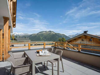 Enjoy breathtaking mountain views from this stunning balcony, perfect for your morning coffee or evening relaxation.