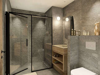 Experience modern luxury in this stunning bathroom featuring a sleek glass-enclosed shower and a stylish wooden vanity with ample storage.