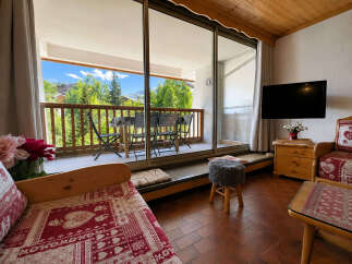 Enjoy breathtaking mountain views from this charming apartment's private balcony, perfect for morning coffee or evening relaxation.