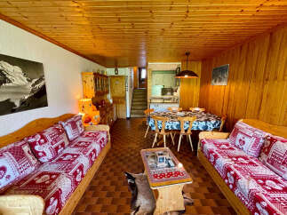 Experience cozy mountain living in this charming alpine retreat.